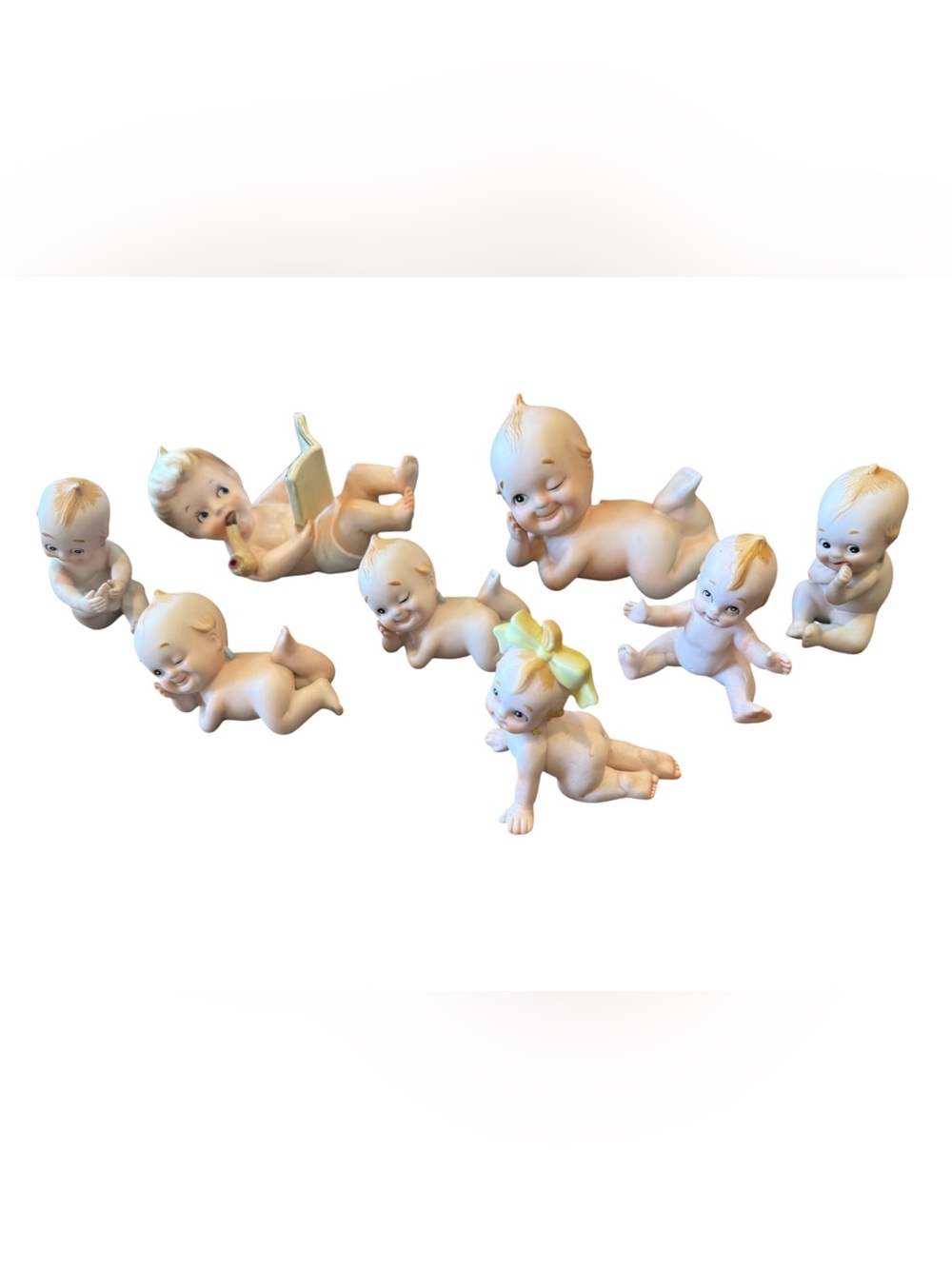 Lefton Ceramic Kewpie-Style Baby Figurine 8 piece set
